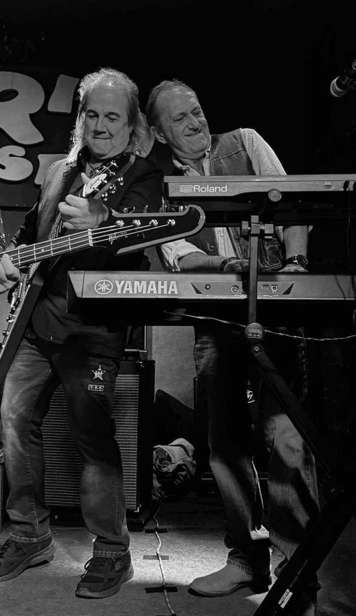 Lindsey White and Chris Sisson performing live