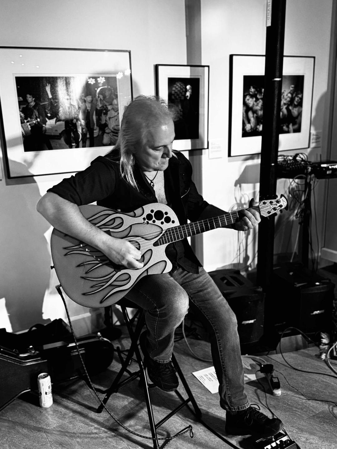 Jason Perry playing his decorated guitar