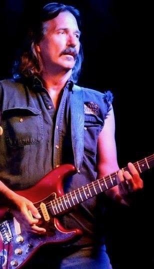Lindsey White with guitar