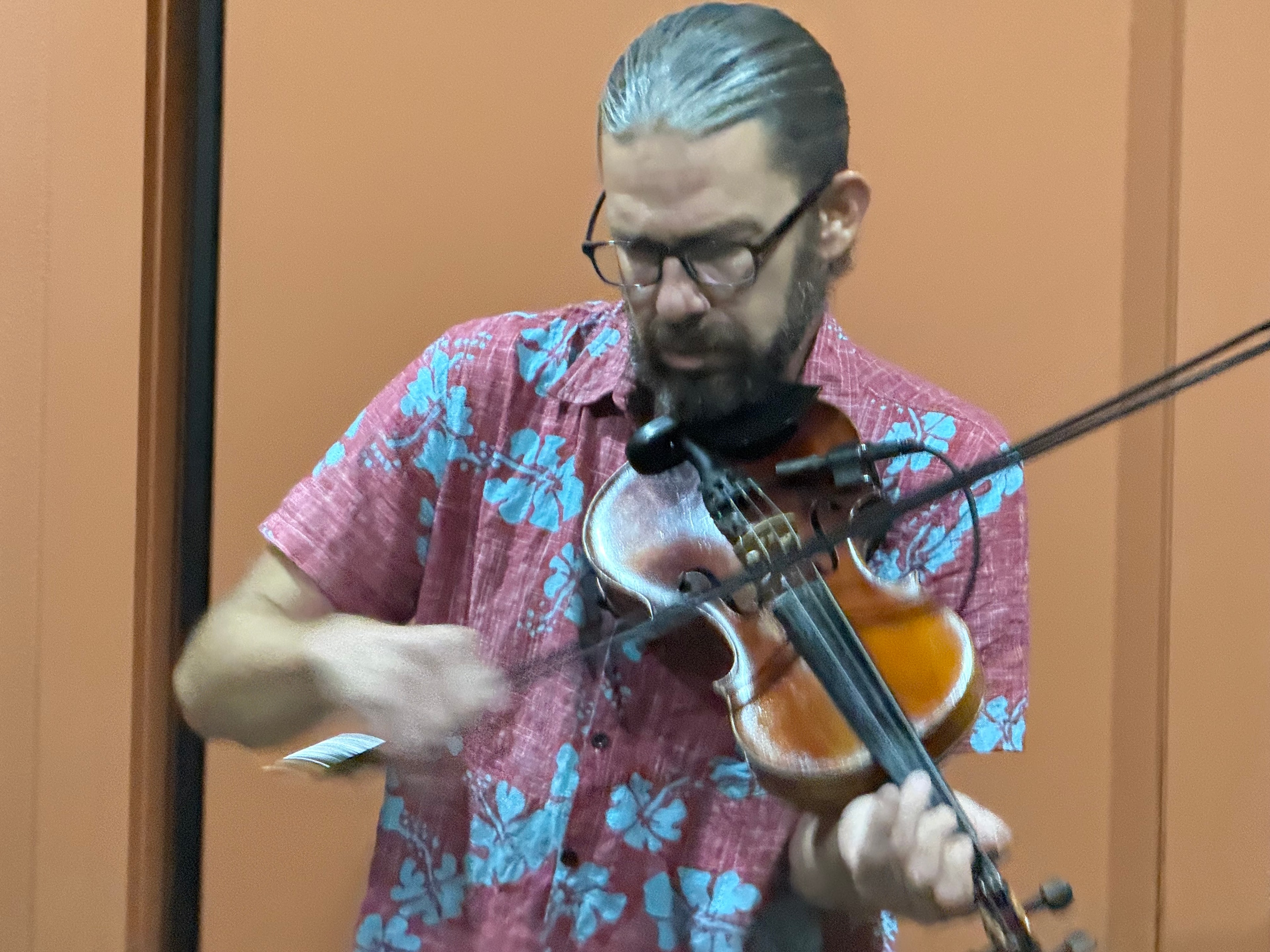 Jesse Allen Porter playing violin in rehearsal
